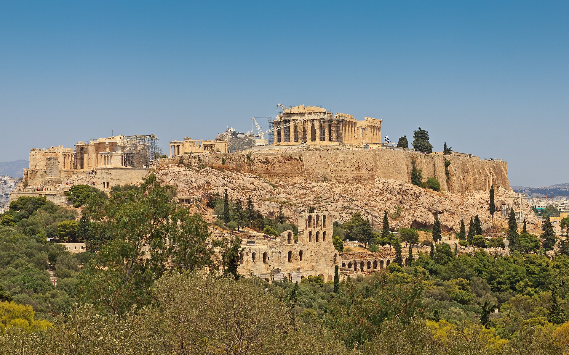 The Acropolis of Athens seen from Philopappos Hill under a hazy summer sky
