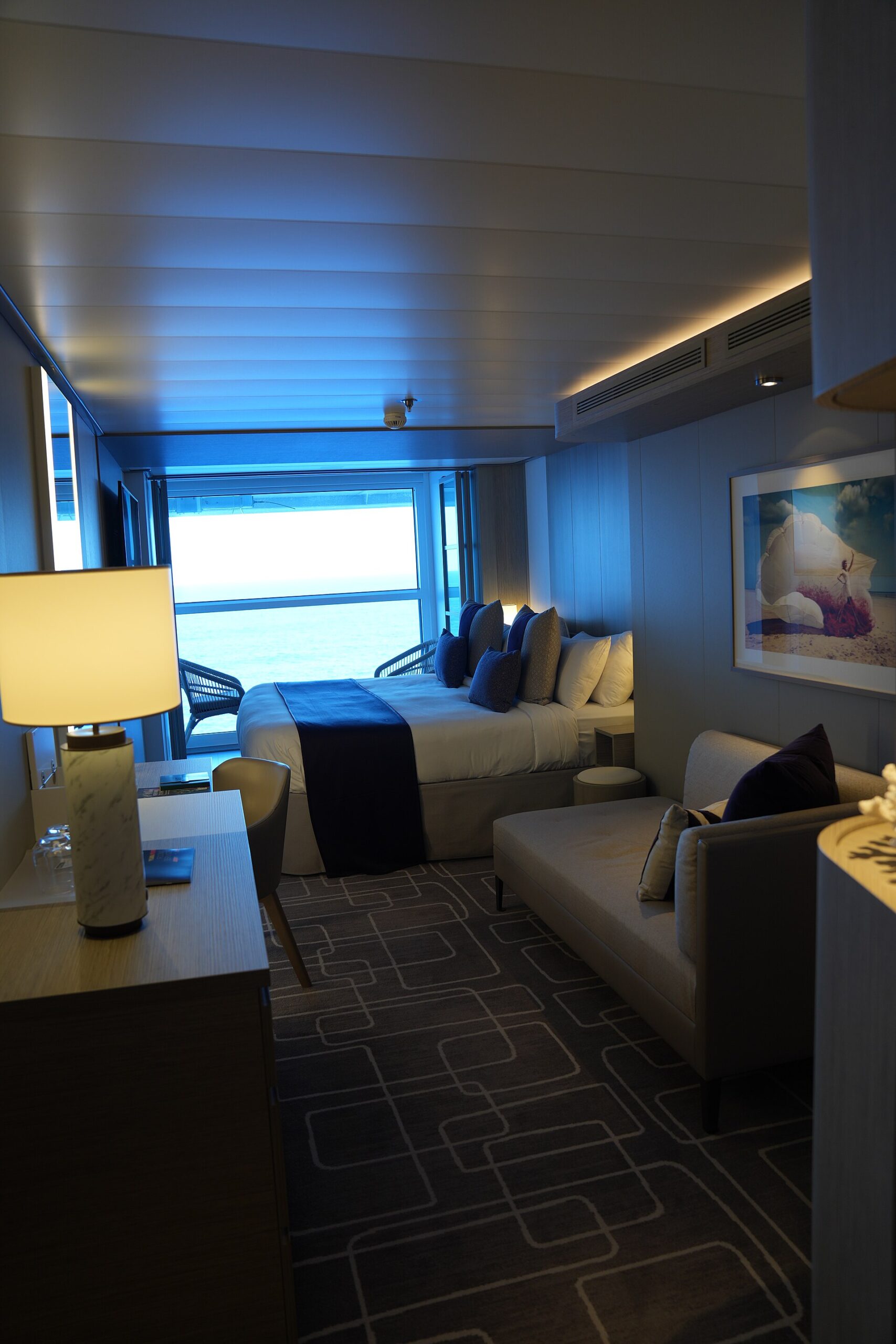 Balcony staterooms on a modern cruise ship, showing the cabin grade that typically costs 30 to 50 per cent more than an inside cabin